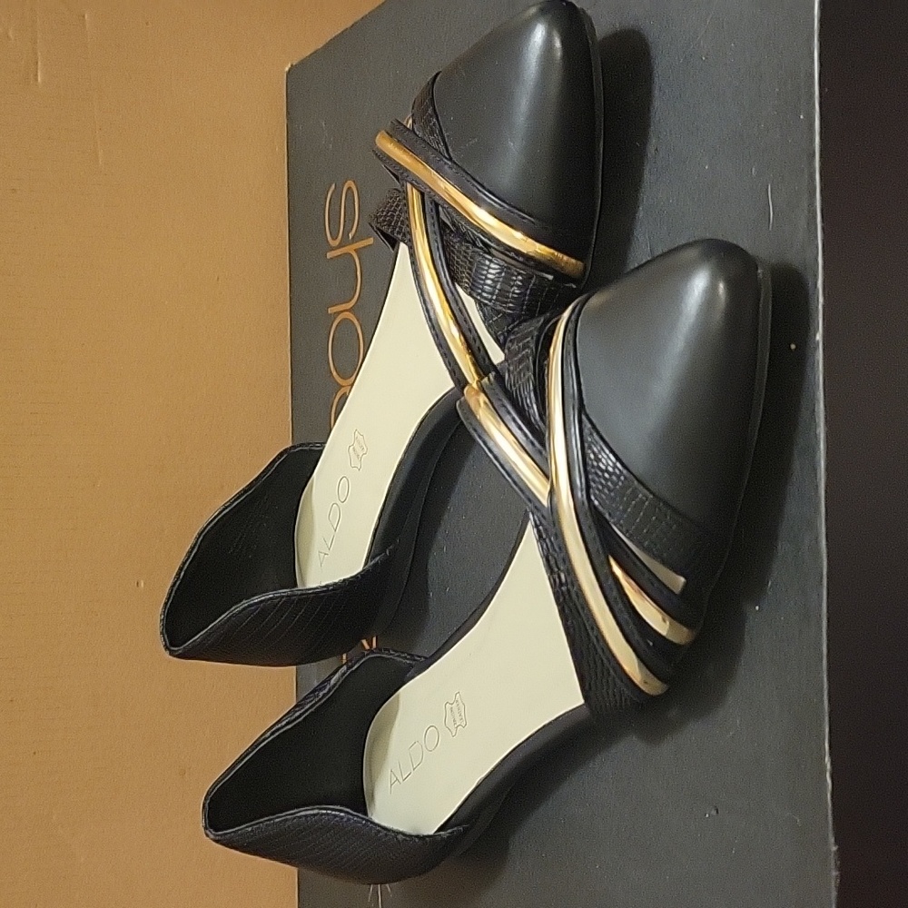 Black and gold flats Aldo